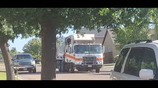 Peña's Disposal picking up green grass that was empty at 4:56 PM