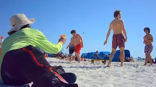 SQUIRTING PEOPLE ON THE BEACH