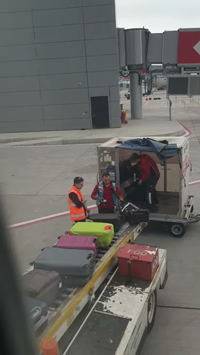 Turkish airlines handling passenger bags at Istanbul airport