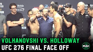Alexander Volkanovski vs. Max Holloway jaw at each other during final face off
