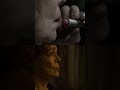 Putting her face on.