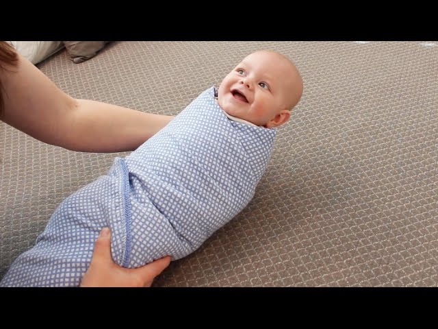 How To Swaddle a Baby class=