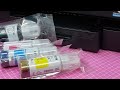 Como hacer primera carga de tinta y configuración de impresora Epson L14150
