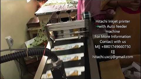 Hitachi Inkjet printer Coding with Auto feeder Conveyor System .