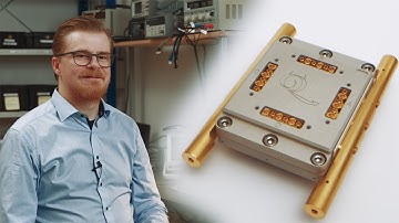 QCage - A New Microwave-cavity Sample Holder for High-fidelity Qubit Measurements
