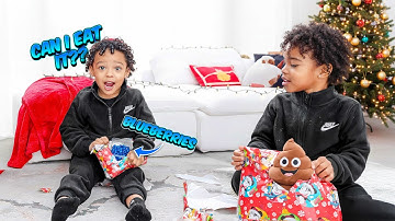 SURPRISING OUR KIDS WITH BAD CHRISTMAS PRESENTS! *Hilarious* |Vlogmas Day 14