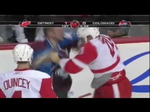 Aaron Downey introduces himself to Ian Laperrière after the cheap shot on Lidstrom