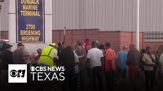 Dockworkers suspend strike after reaching tentative deal until Jan. 15