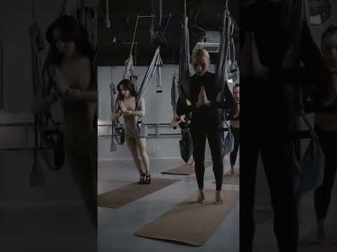 women doing aerial yoga