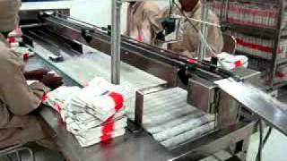 Universal  Collator Secondary packing area.wmv