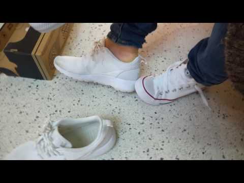 She is swapping her Nikes to new Converse sockless in public