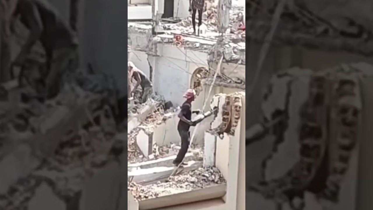 Demolition of building with jackhammer 