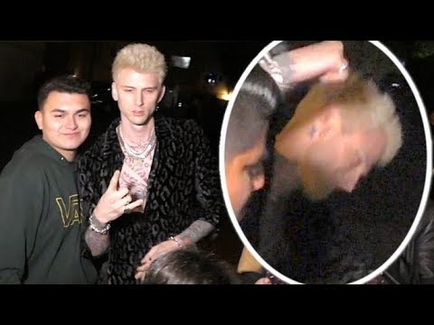 Machine Gun Kelly LOSES IT When Fan Mentions Eminem Feud!