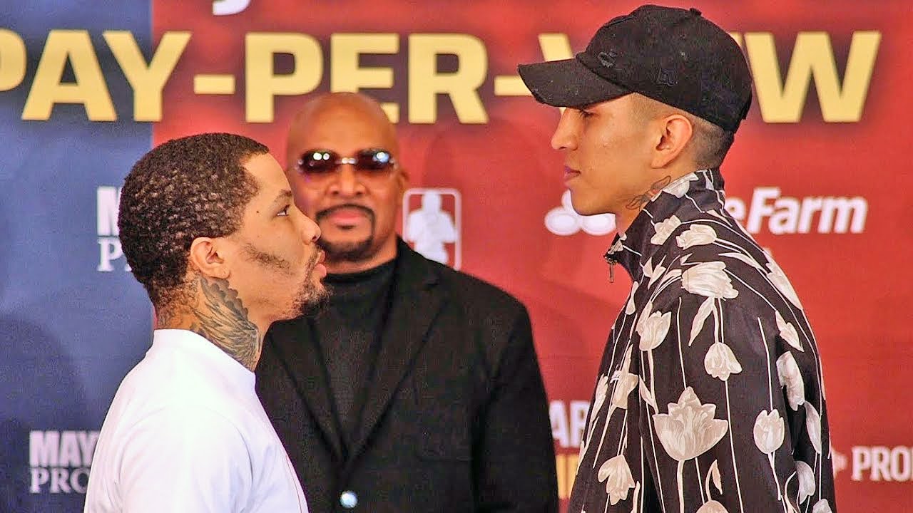MARIO BARRIOS LOOKS DOWN ON GERVONTA DAVIS DURING FACE OFF AT FINAL PRESS CONFERENCE