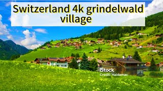 Switzerland 4k grindelwald village Aerial view
