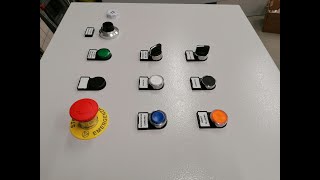 Time lapse video about assembling and wiring pushbutton for a small electrical cabinet