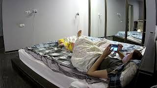 Girl sneezing in bed and showing her feet