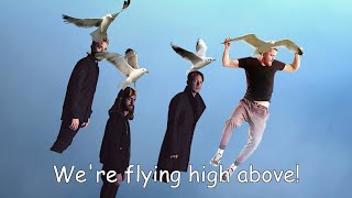 Dan Reynolds attempts to fly with the power of birds at his side