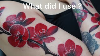 Red flower tattoos - ziggy tattoo school