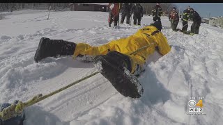 Worcester Firefighters Plunge Into Frigid Water For Ice Rescue Drills