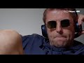 Liam Gallagher listens to Noel