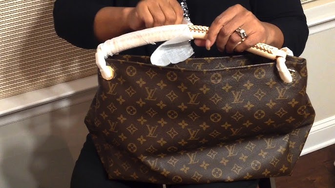 I bought a fake Louis Vuitton purse from AliExpress 