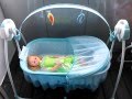Electronic Baby Soothing Motions Cradle With Music And Swing