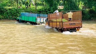 Tata 1612 4x4 heavy duty truck rescuing Tata 407ex 6 wheeler from flooded river.