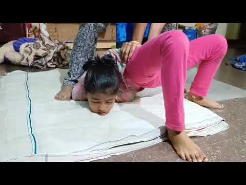 Crazy Indian contortion girl doing passive back bend training