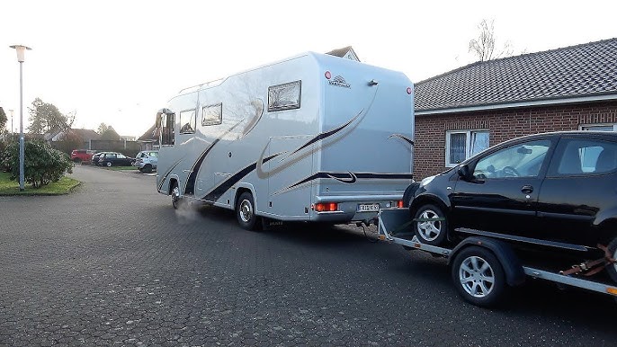 WOHNMOBIL mit Anhänger & Schneemobil Rückzug