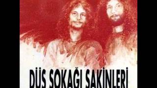 Video thumbnail of "Düş Sokağı Sakinleri - Güneşin Değdiği Yerden"