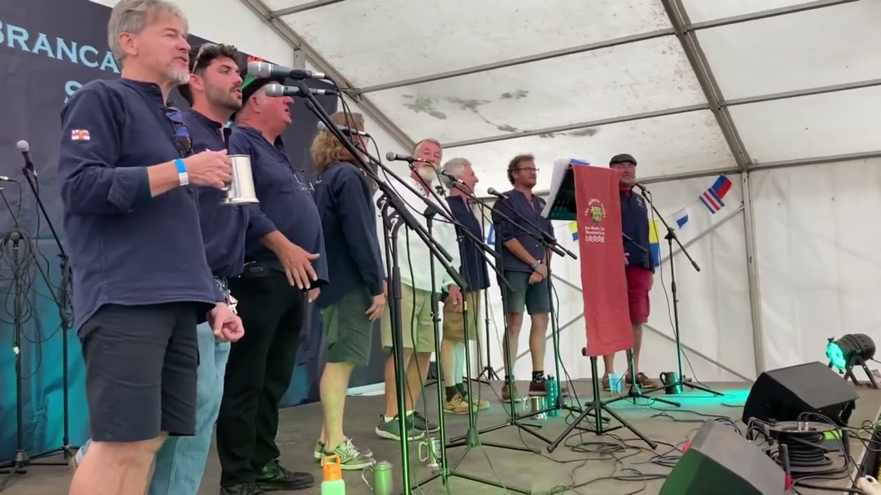 The Wellington Wailers performing 'Drunken Sailor' at Brancaster Staithe's Sea Shanty Festival.