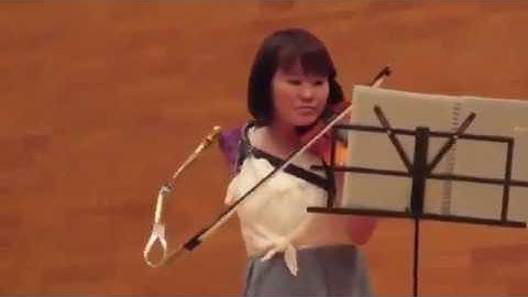 Woman playing the violin with the robot arm!