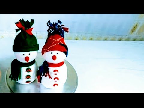 Vídeo: Como Fazer Um Boneco De Neve Com Meias