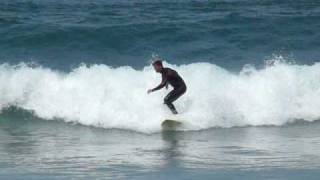Oyambre beach surfer