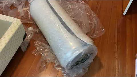 Unwrapping a Compressed and Sealed Mattress, watch it jump! Vacuum sealed