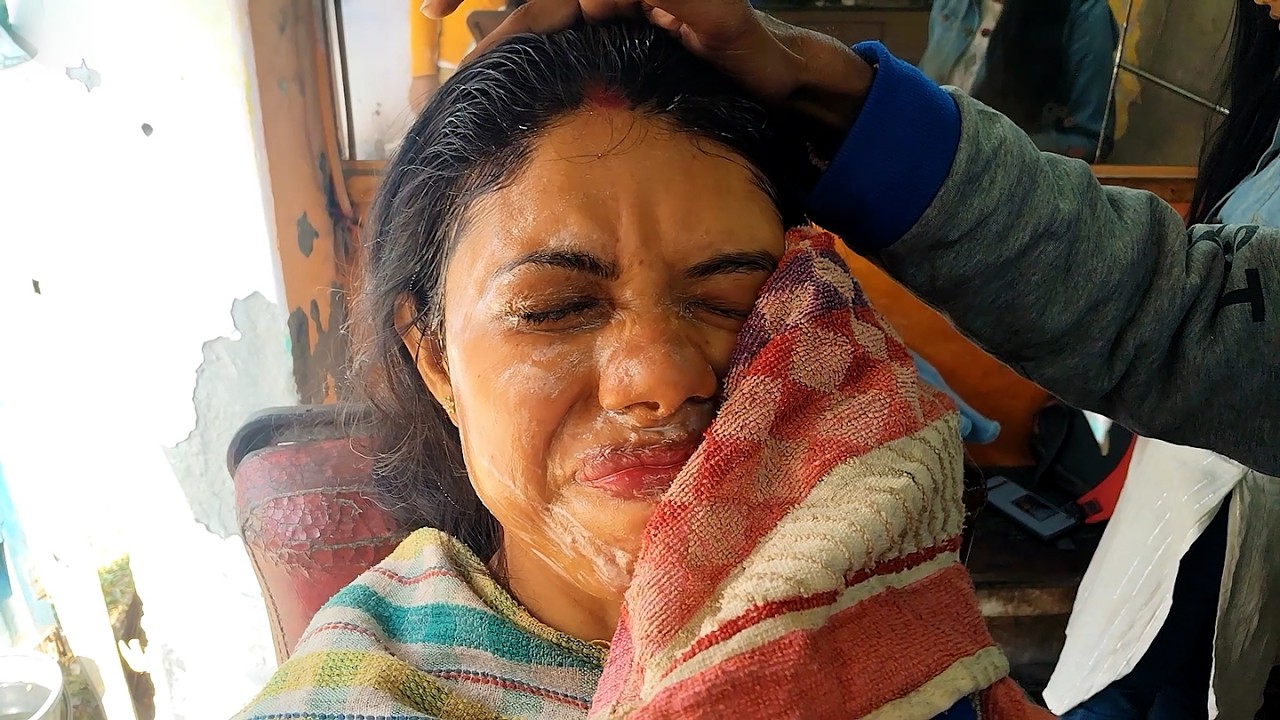 Indian mother gets a taste of a road side barbershop 💈