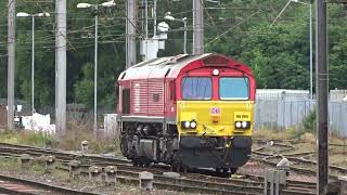 The Class 66 DB Cargo UK (Red Livery) No.66066 'Geoff Spencer' at the Carlisle Citadel Station. [V2]