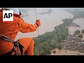 People rescued from rooftops in flood-stricken Brazilian state of Rio Grande do Sul