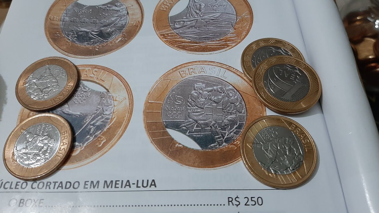 MOEDA ESCASSA DE 1 REAL ANO 2016 OLÍMPICO BOXE NÚCLEO CORTADO EM MEIA LUA VALOR 200, A 250, REAIS👍😱🤝