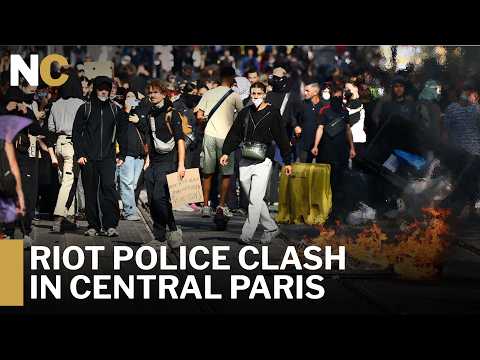 Watch: Tear Gas & Flares As French Police Fight Protesters In Paris | News Central | AM1F