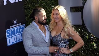 Andrade 'Cien' Almas and Charlotte Flair WWE 20th Anniversary Celebration Event Blue Carpet screenshot 5