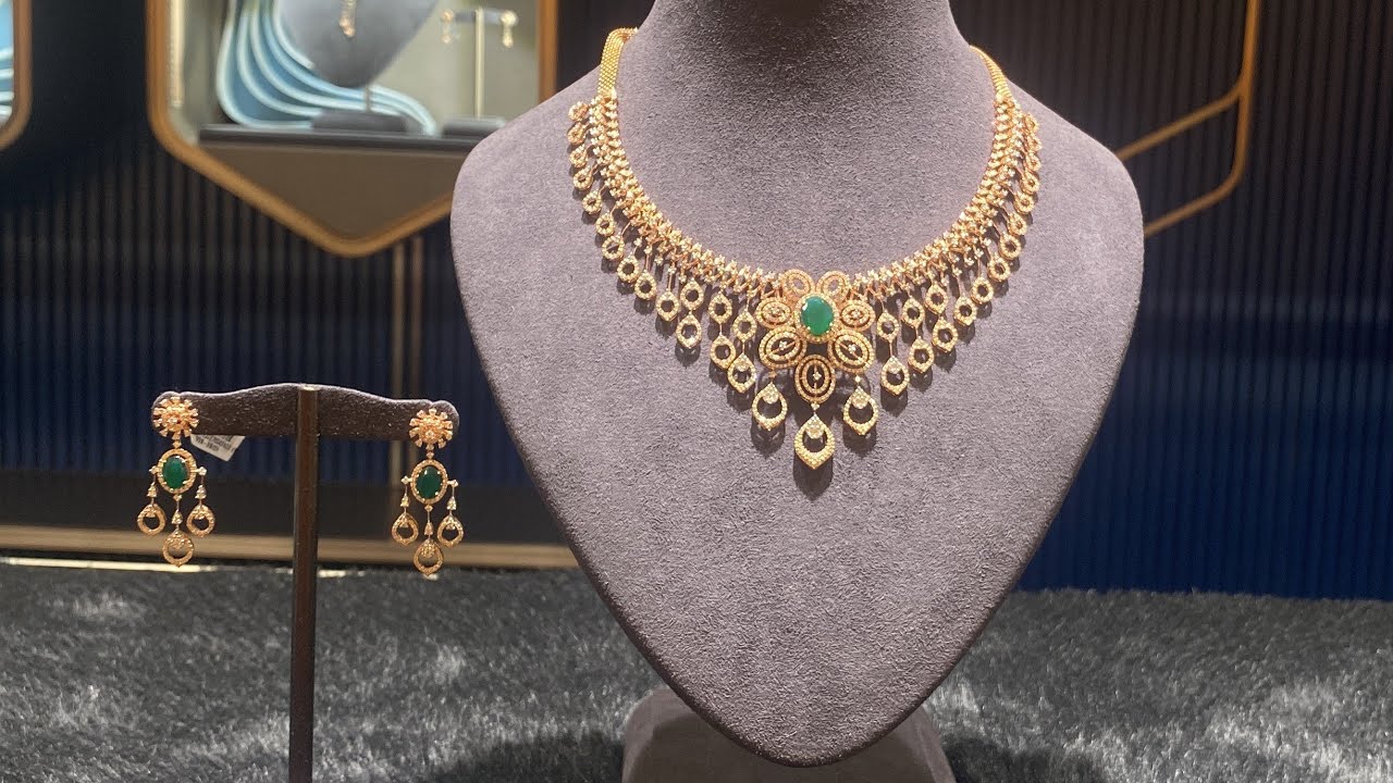 Malabar gold and diamonds exclusive diamond necklace design's//Diamond show//Kotha bangaru lokam