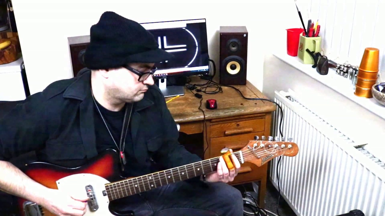 Jedson Telecaster Guitar and a Blues Bottle Slide