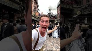 An American boy says, "A train is going over the market. It looks really beautiful and impressive!"