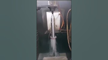 How workers loading the axles in the CNC high frequency induction hardening machine easily