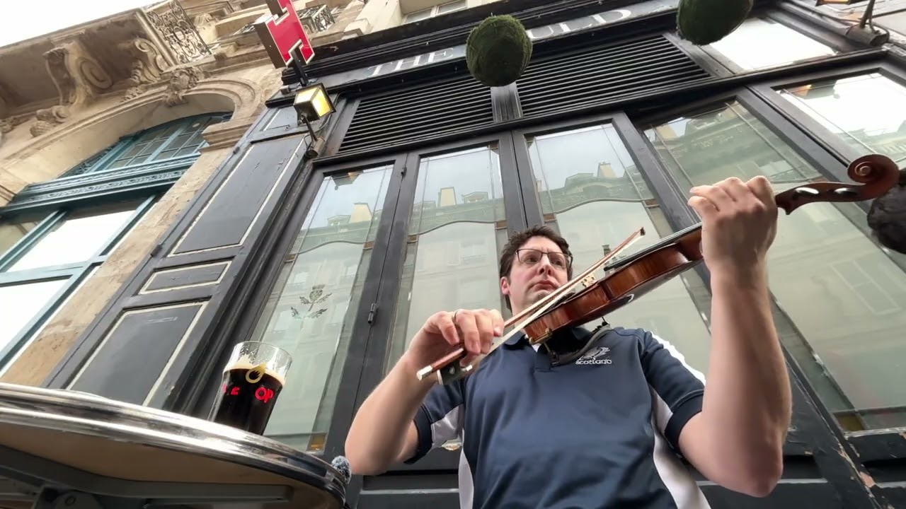 On the road in Paris at a Scottish Pub. First outside fiddling of 2026! #travel #paris #tradmusic
