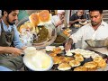 Famous bun kabab making  special egg anda shami burger  pakistani street food bun kabab