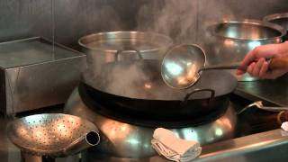 Mok Kit Keung prepares a dish at Shang Palace, HK