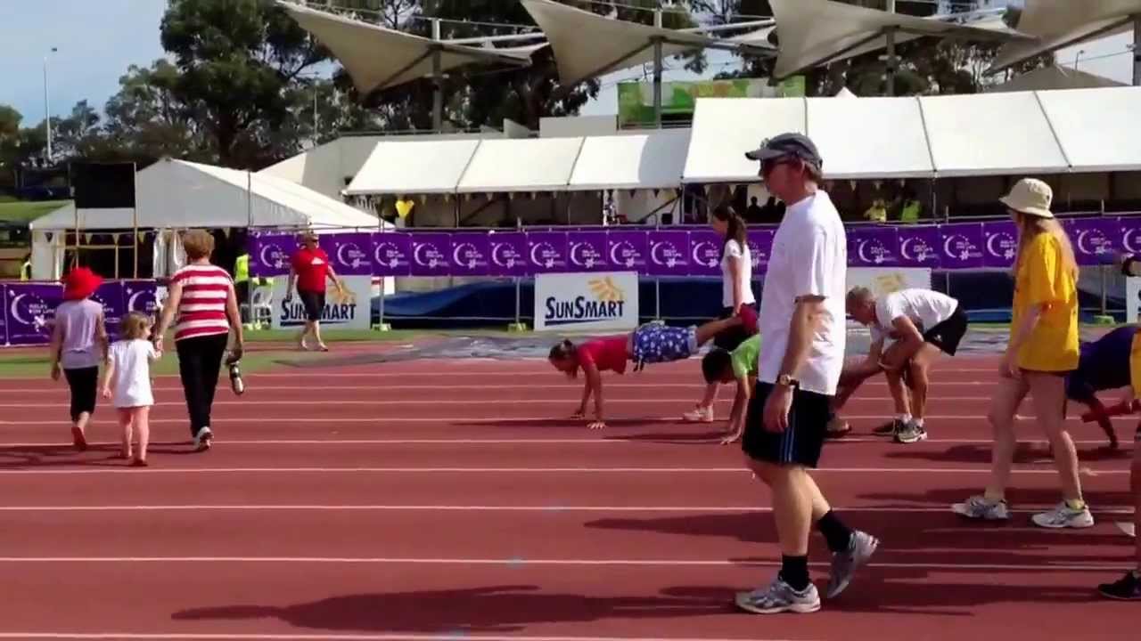 Thornlie Youth kids going the wheelbarrow at Relay for Life Perth 2013